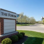 A modern multi tenant monument sign at a Columbus commercial real estate development