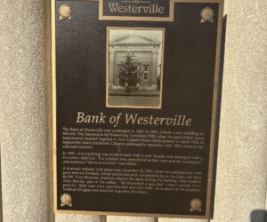 Cast Bronze plaque | Etched portrait on metal Cast bronze plaque historic district marker in Uptown Westerville
